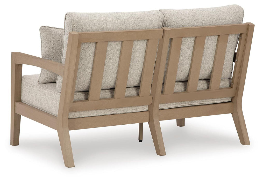 Hallow Creek Outdoor Loveseat with Cushion - US Furniture & Mattress (Waterbury,CT)*