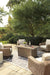Beachcroft Beachcroft Fire Pit Table with Four Nuvella Swivel Lounge Chairs - US Furniture & Mattress (Waterbury,CT)*