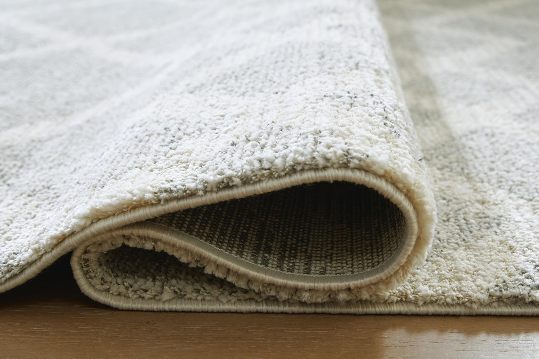 Unawick Medium Rug - US Furniture & Mattress (Waterbury,CT)*
