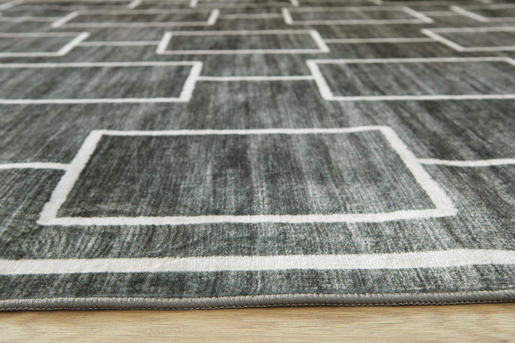 Elderland Washable 7'6" x 9'6" Area Rug - US Furniture & Mattress (Waterbury,CT)*